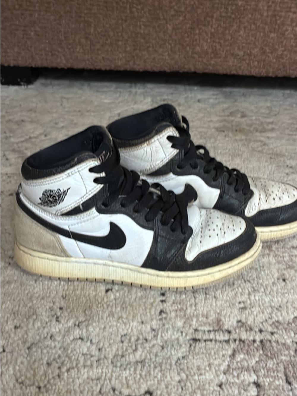 Nike Air Jordan 1 Mid Sneakers in White and Black